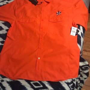 Antigua, Houston Astros orange shirt.